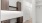 an open office area with wood floors and wood cabinets