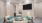 a clubroom with a tv and chairs