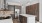 a kitchen with wooden cabinets