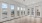 a room with white walls and windows