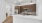 a kitchen with wooden cabinets